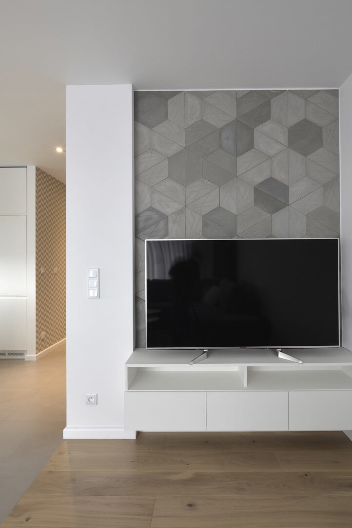 Salon z elementami betonowymi